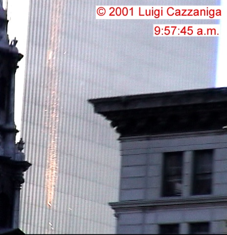 Figure 66. (9/11/01) Glowing material emerging from WTC2 at 9:57:45am maintaining color consistency during freefall, inconsistent with rapid cooling of molten metal, demonstrating electroluminescence.<br>- Image by Luigi Cazzaniga