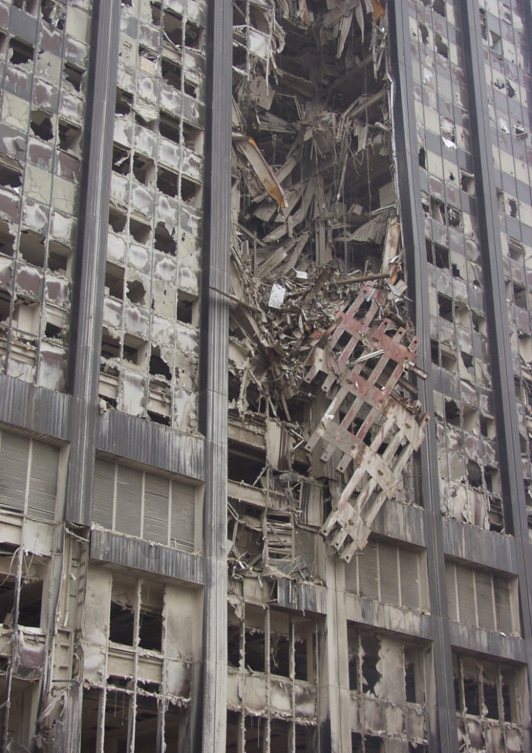 Figure 74. (9/20/01) Close-up view of Bankers Trust gash showing geometrically linear debris remaining unbent and pristine despite massive impact energy. <br>- Photo by Michael Rieger