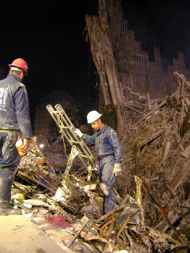 Figure 104. (9/21/01)Close-up view of Liberty Street showing shriveled beams and anomalous deformation patterns inconsistent with gravity-driven collapse.<br>- Image by FEMA